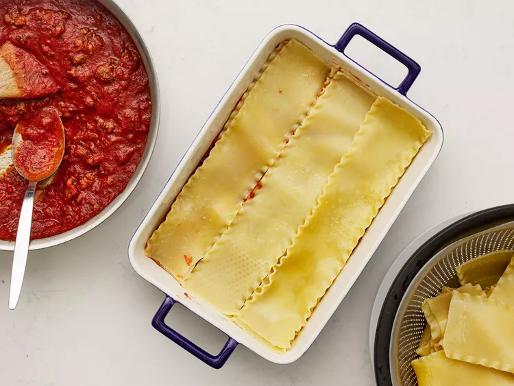 Queso agregado a la lasaña